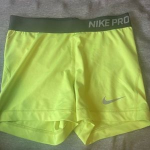 Neon yellow M in kids Nike Pros